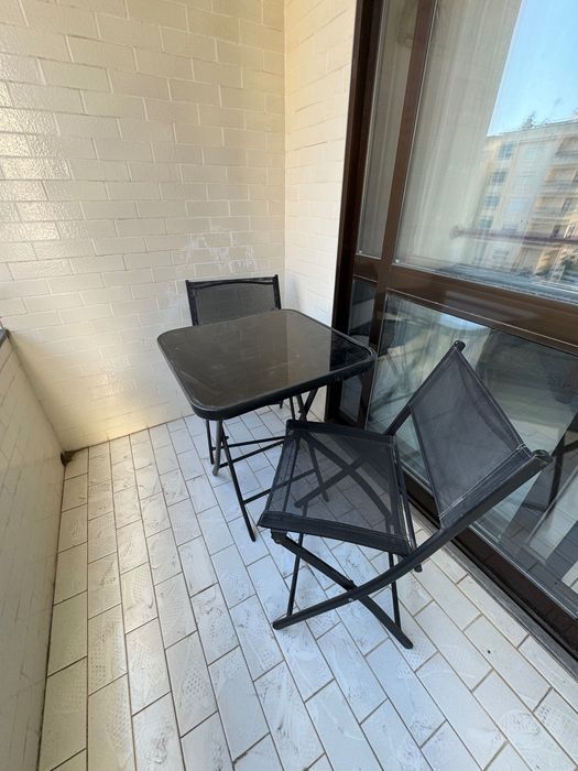 Conjunto mesa e cadeiras área externa jardim preto