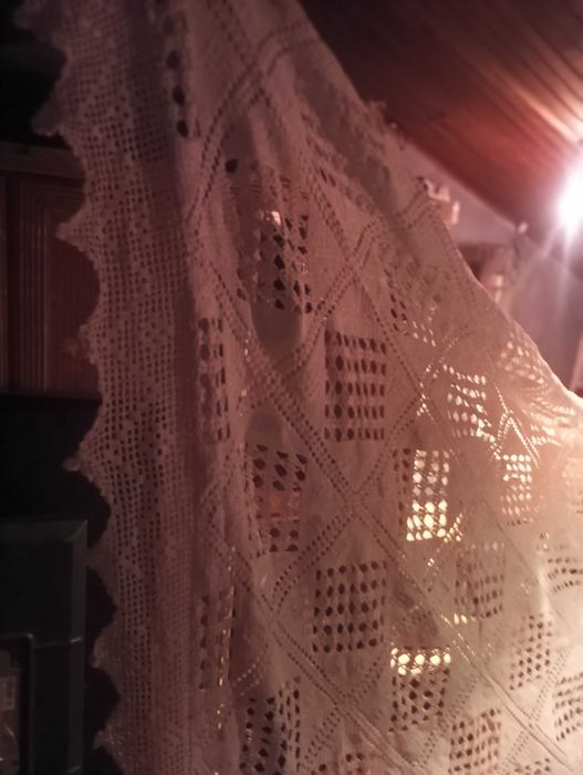 Coberta de renda feita á mão