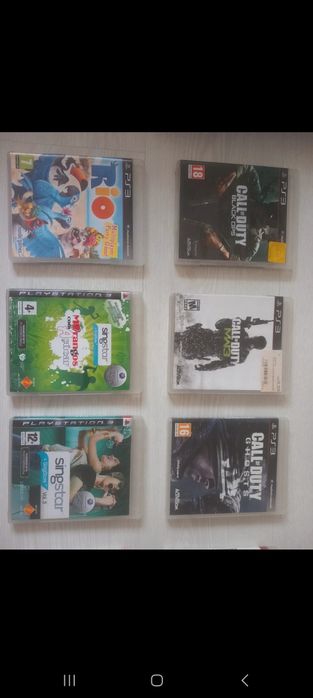 Playstation 3 com comando e jogos