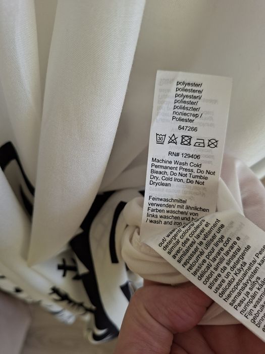 Nowa biała sukienka z wzorem 44