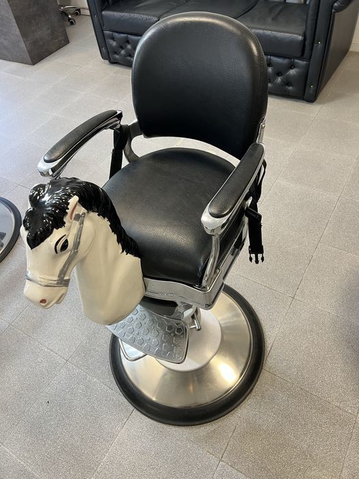 Cadeira de criança barbearia