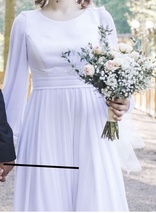 Весільна сукня з шифоновим низом.