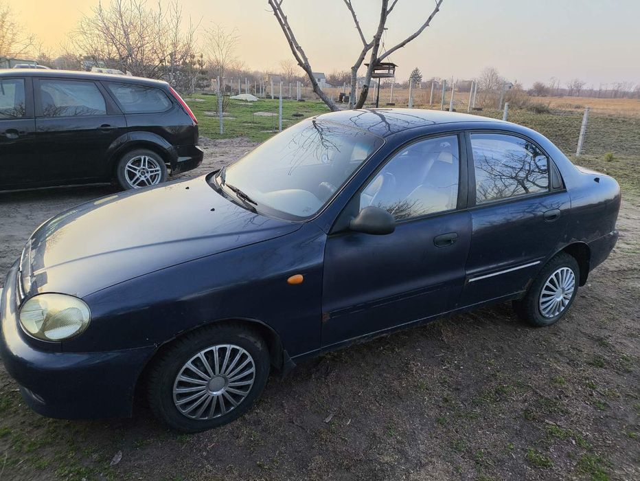 Ланос 1,5    SX   комплектация полная