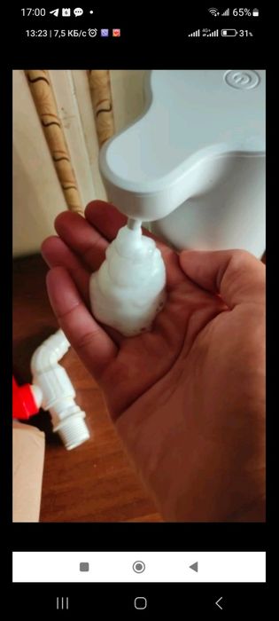 Автоматичний дозатор для миючого засобу