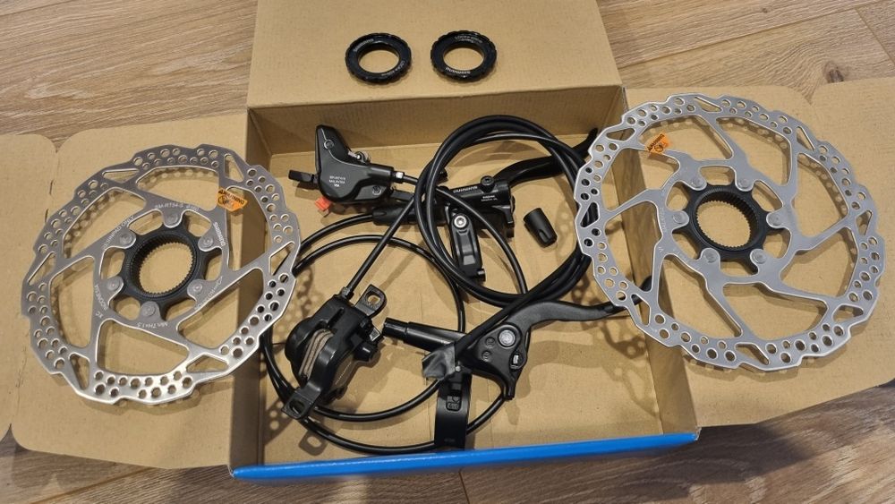 Hamulce tarczowe hydrauliczne SHIMANO DEORE BL-M4100 / BR-MT410 / Tarcze hamulcowe SM-RT54 160mm / 180mm nowe komplet
