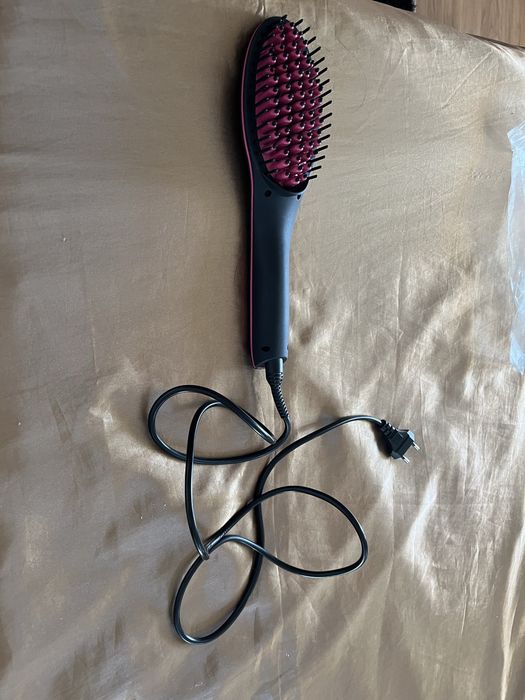 Escova eletrica alisadora.
