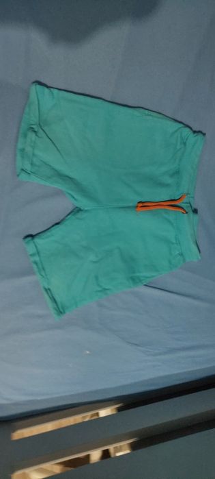 Krótkie spodenki niebieskie rozmiar 128