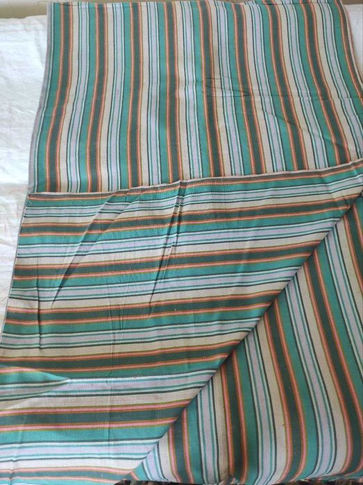 Ткань мягкая, на маркизы. Двухсторонняя.