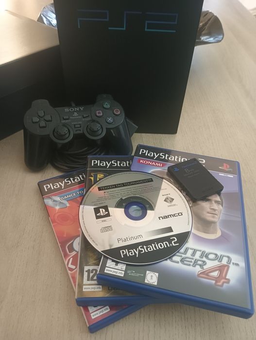 PlayStation 2 FAT (PS2) e cabos + comando e 4 jogos + cartão de memória