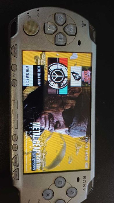 Портативна ігрова приставка PSP Slim Ice Silver 64gb з іграми