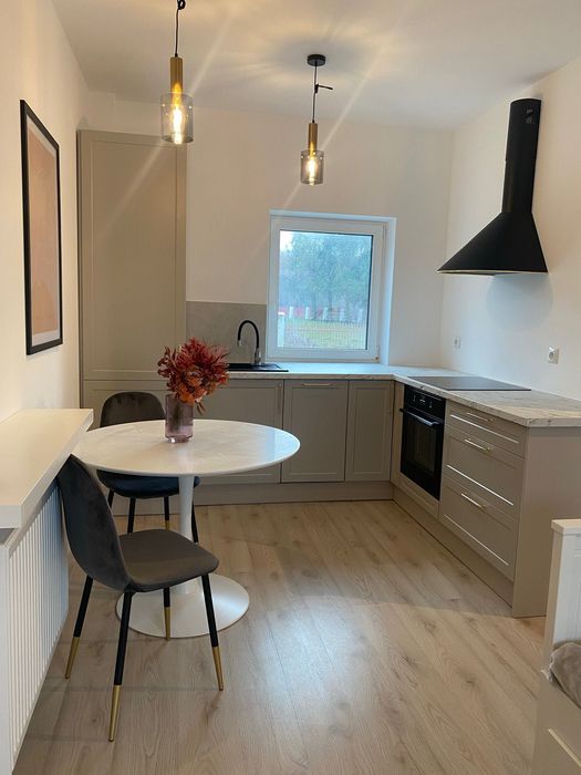 Osiedle Skrzydlate - bezczynszowa nowoczesna kawalerka (34 m²) z ogrodem (45 m²) i tarasem z 2 miejscami postojowymi - Widok 3