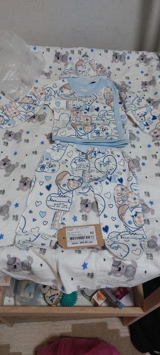 Новий костюмчик 62 р