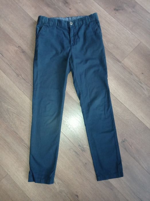 Granatowe eleganckie spodnie chłopięce r. 140 H&M
