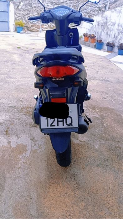 Suzuki address moto com pouco uso só anda de verão.muito credível