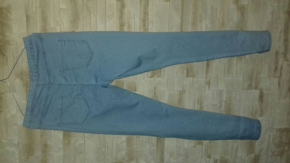 H&M spodnie rurki z dziurami 40