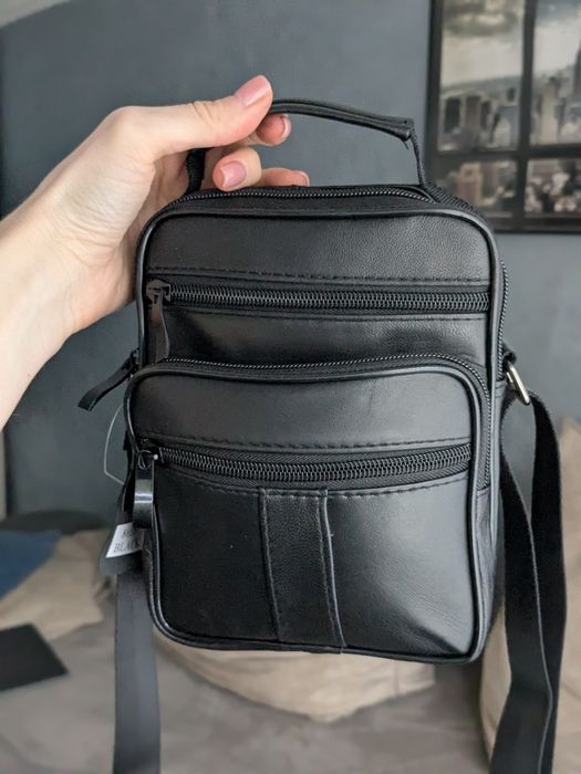 Стильна чоловіча шкіряна сумка з короткою і довгою ручкою