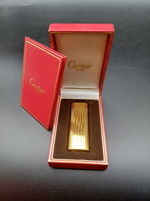 Isqueiros (Cartier e Dupont)