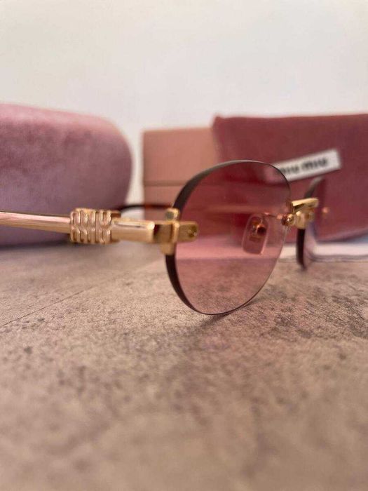Óculos de Sol Miu Miu Rosa