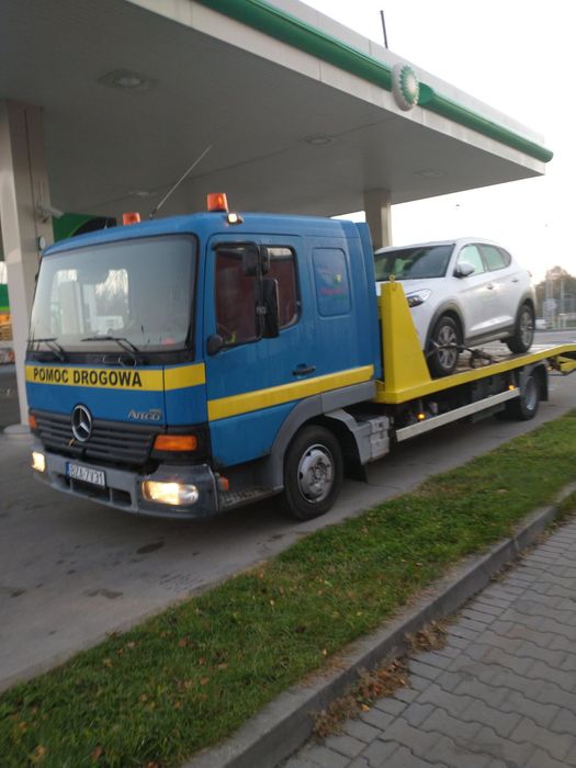 Pomoc drogowa, laweta, transpo maszyn, usługi minikoparka