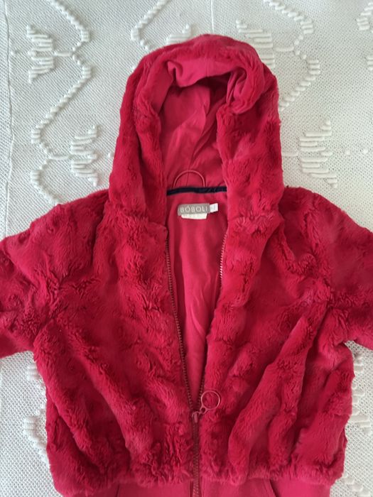 casaco quentinho para menina de 10 anos, da Bóboli. ideal para dias mais frios