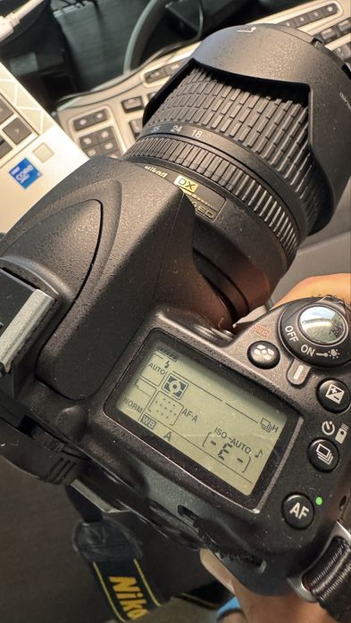 Corpo Nikon D90 com grip