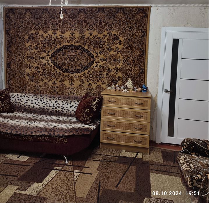 Продам в Харківській  обл, м.Балаклії 1/2 частку часного будинка