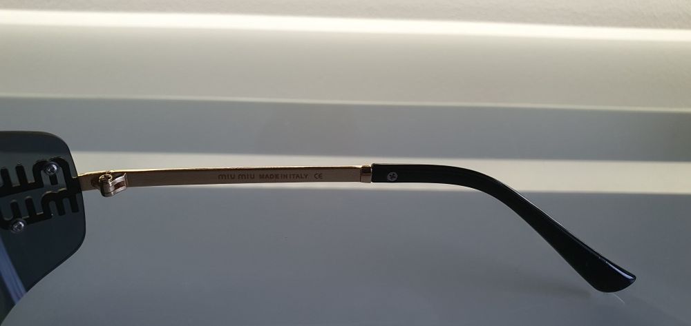 Okulary damskie Miu Miu
