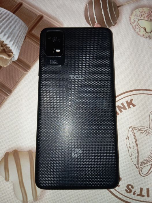 Телефон TCL T607