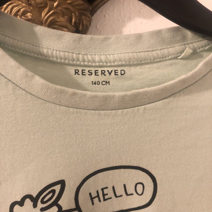 Bluzka Reserved z nadrukiem stan idealny