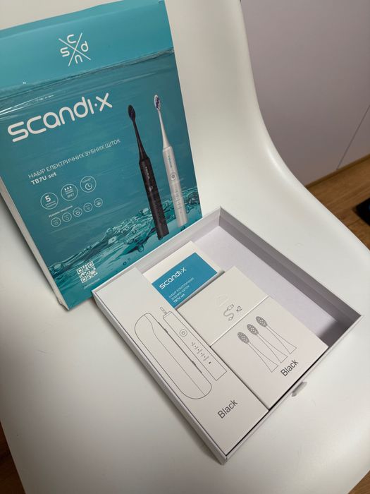 Новая зубная электрическая щетка черного цвета Scandi.x