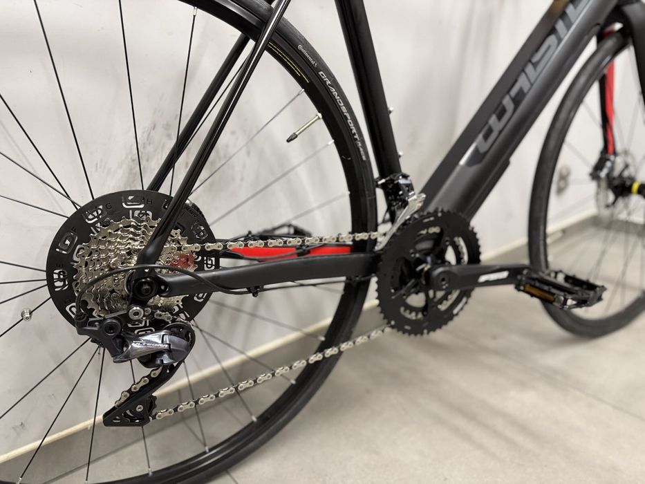 Szosowy rower elektryczny Whistle Flow adv carbon ultegra