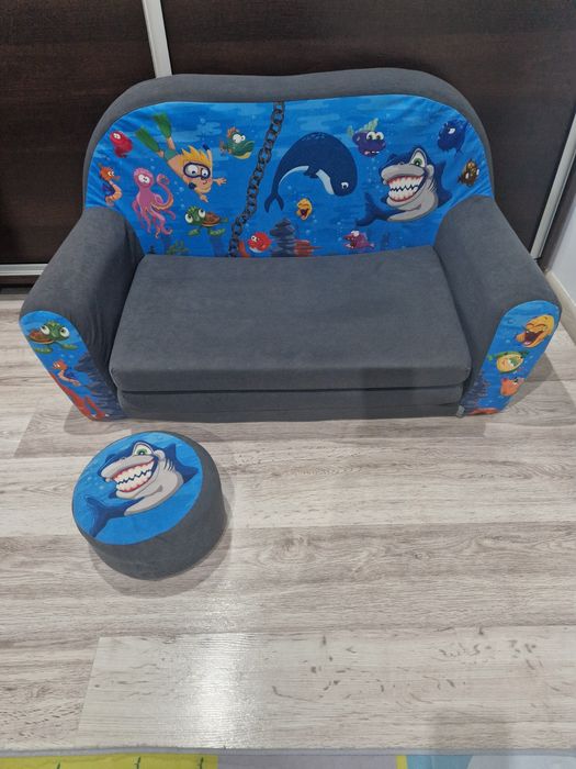 Sofa piankowa rozkładana z poduszką i pufą