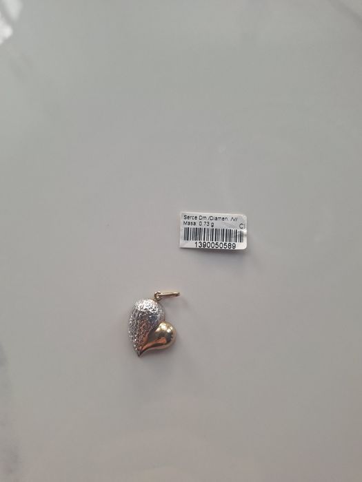 Złota zawieszka serce 333 diamentowane nacinane