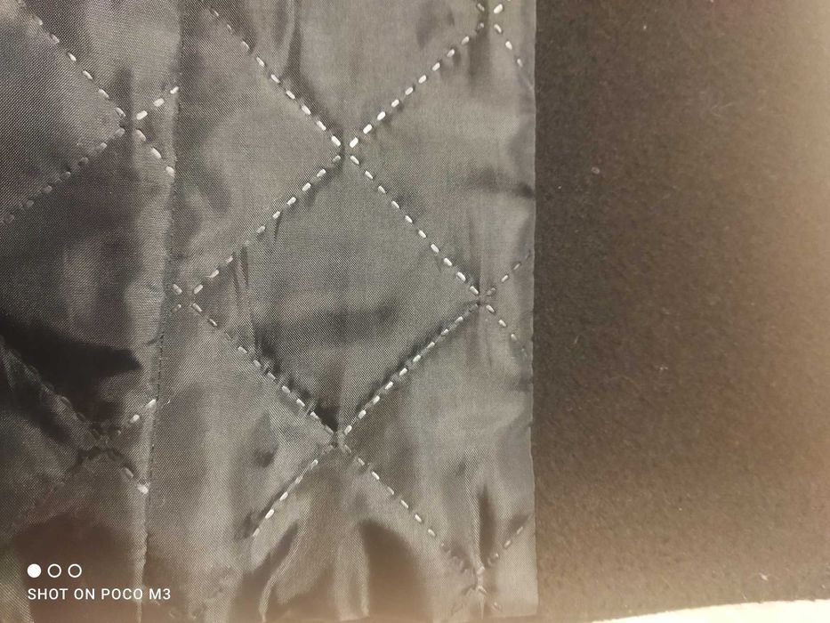 Ocieplany płaszcz flauszowy .