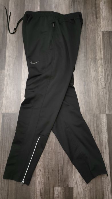 dresowe , sportowe, grubsze spodnie NIKE dri -fit z zamkami