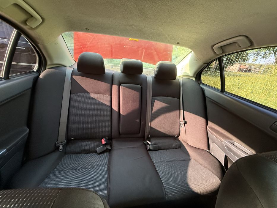 Lancer 10 2011 2.0 автомат / газ