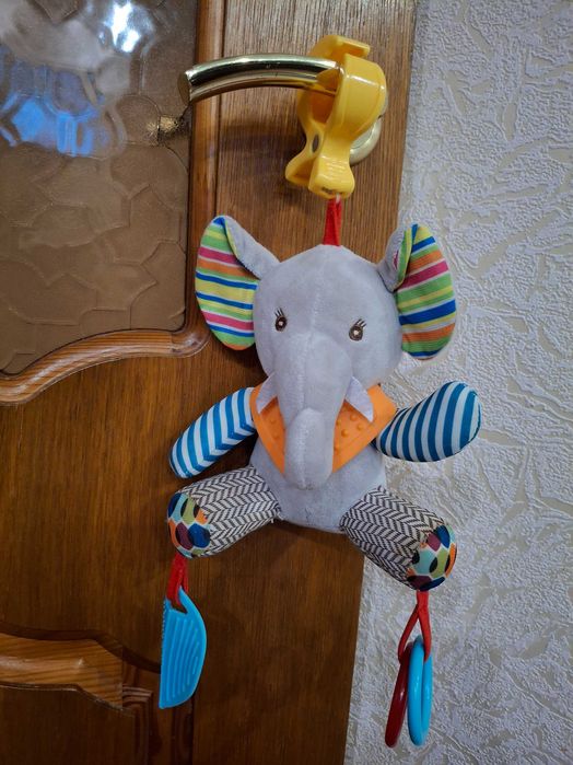 Іграшки на коляску