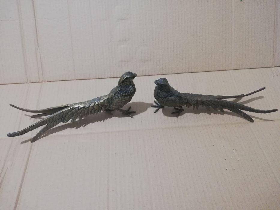 Casal faisões em metal