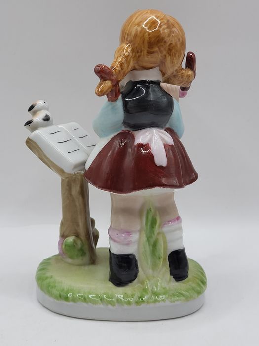 Porcelanowe figurki muzyków, 2 szt.