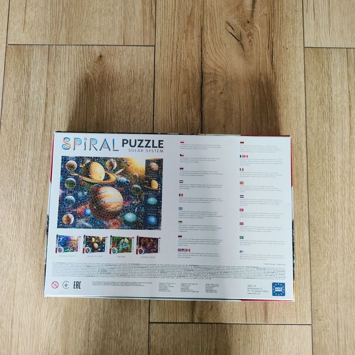 Puzzle Trefl spiralne Kosmos 1040 elementów niekompletne