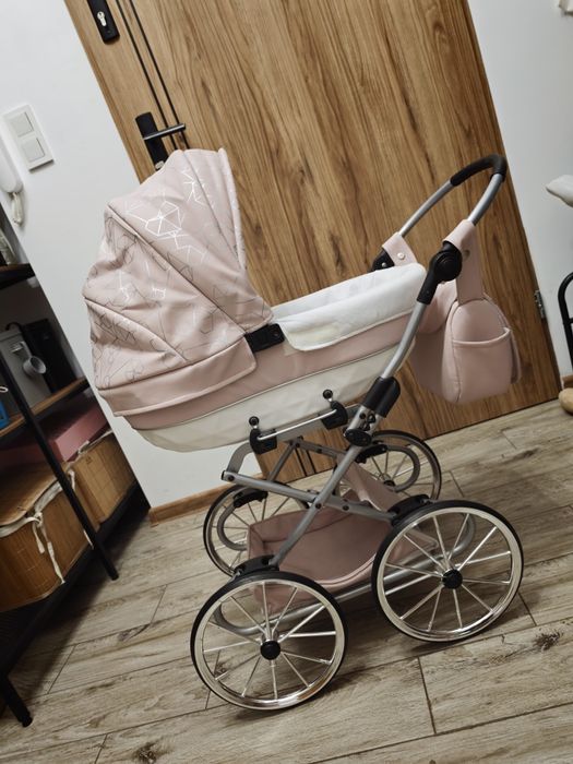 Wózek dla lalki + Baby Born + ubranka + walizka na kółkach – zestaw