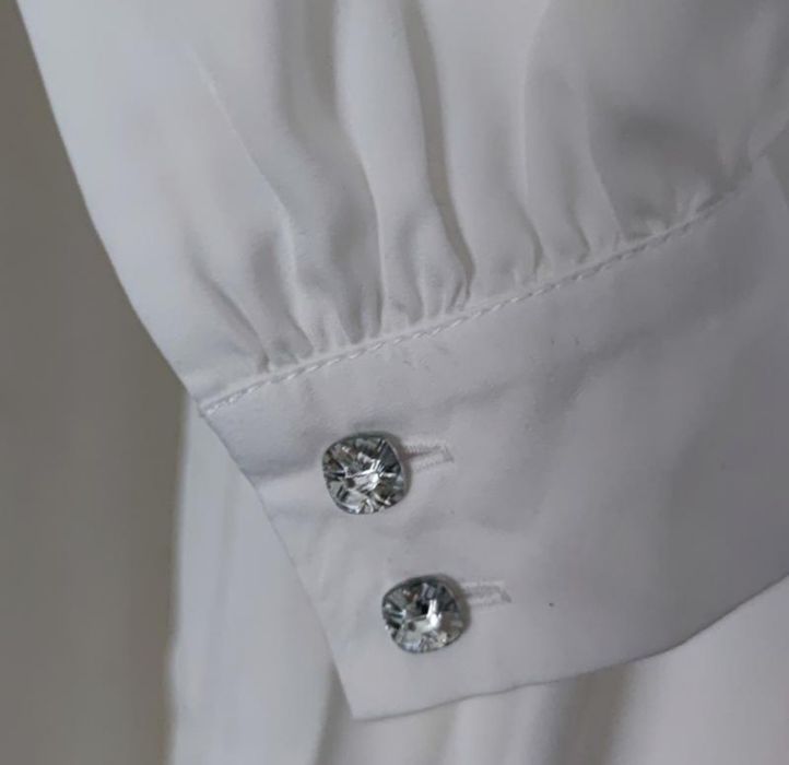 Весільна біла сукня