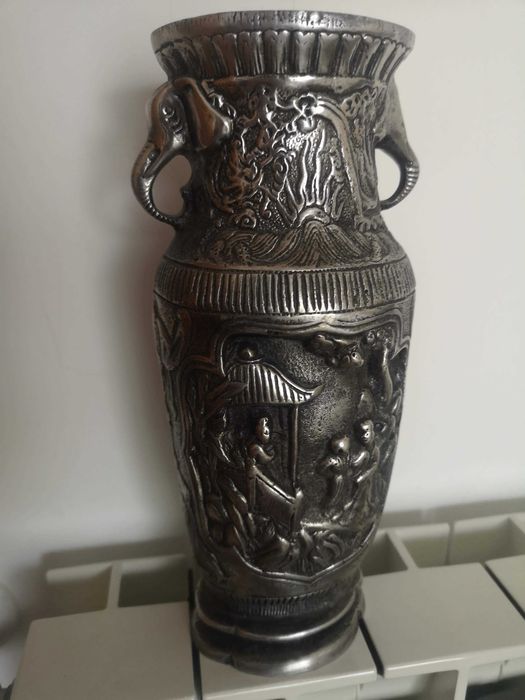 Iron Jug with Relief Decorations