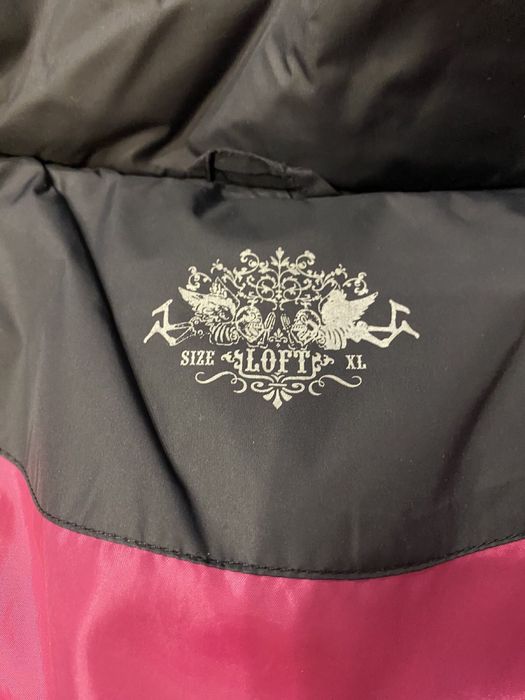 Женский пуховик …