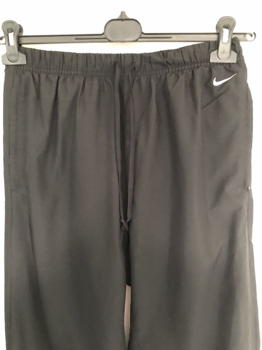Czarne ortalionowe spodnie dres nike uniwersalne w bdb stanie