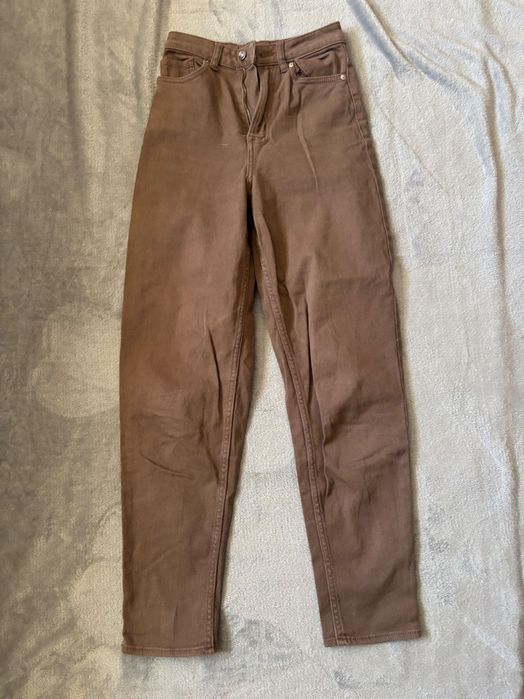 Коричневі джинси