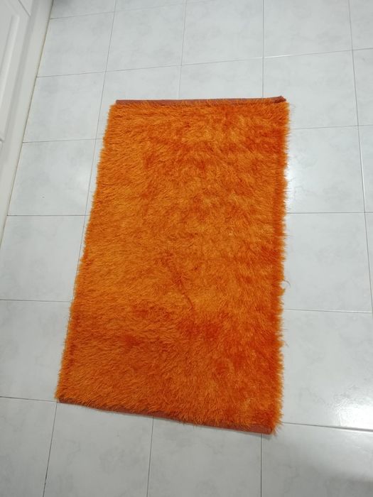 Tapetes com pelo alto