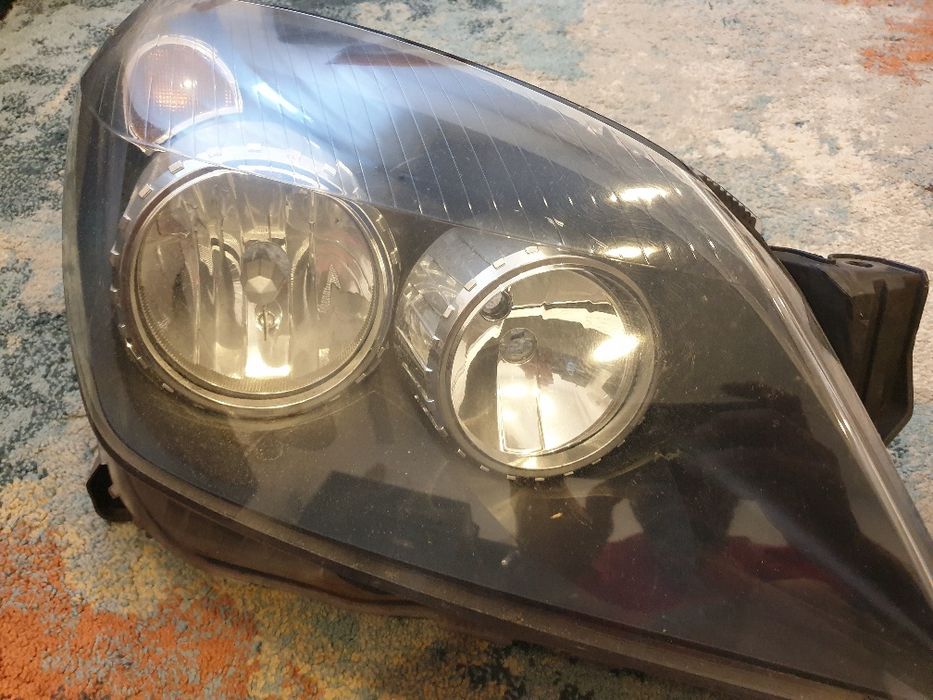 Faróis originais Opel Astra H