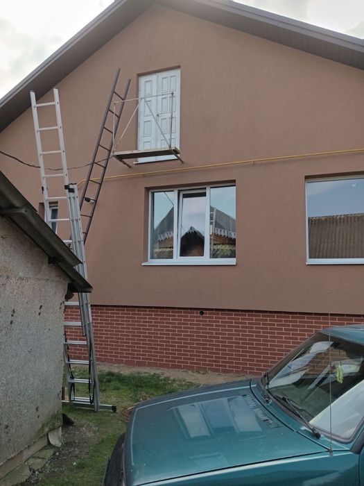 Утеплення фасаду,  декоративна штукатурка, імітація цегли, дерева