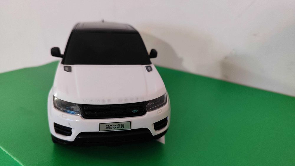 Іграшка машинка автомобіль Land Rover Range Rover Sport у масштабі 1:24